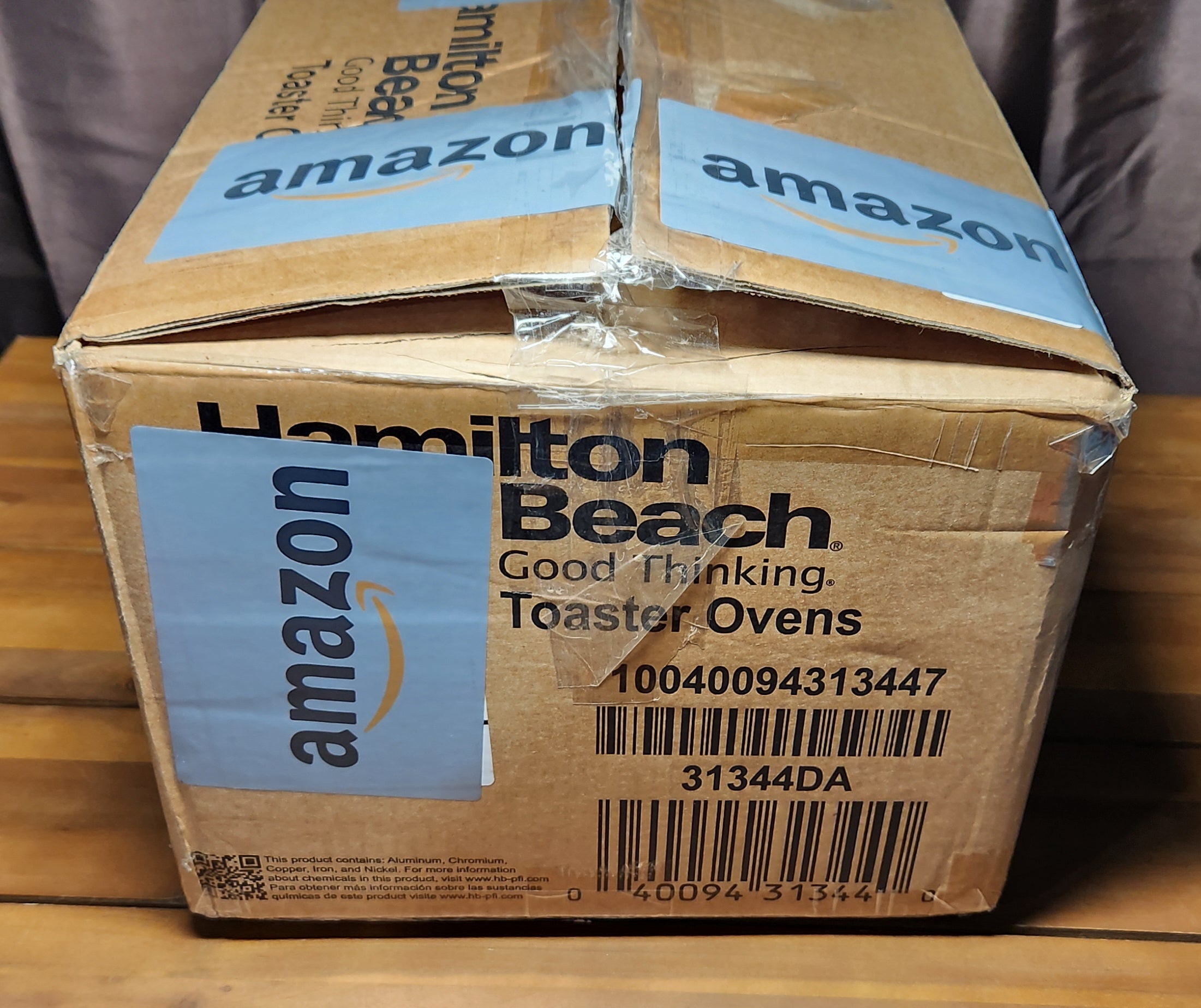 Hamilton Beach Easy Reach 4-Slice Countertop Toaster Oven With Roll-Top Door